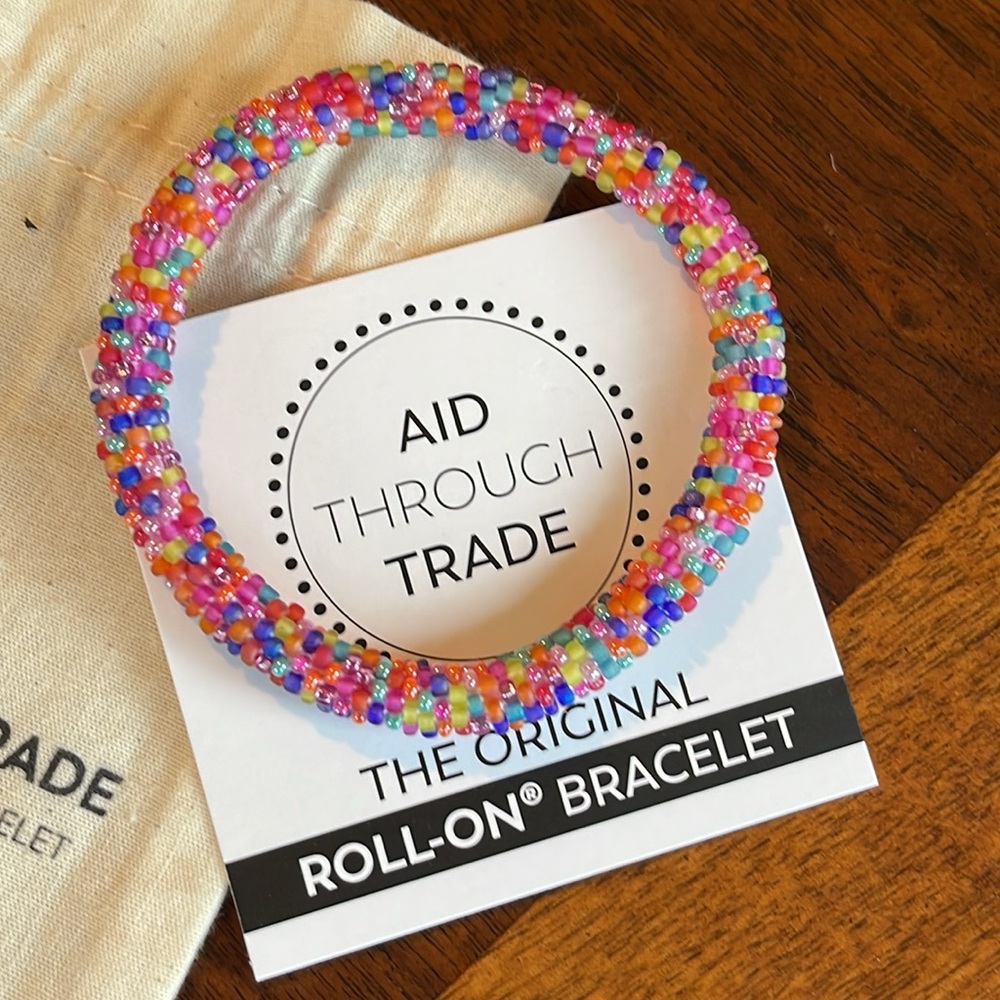 AID THROUGH TRADE ROLL ON ADORABLE CANDY SPRINKLES BRACELET - BEAUTIFUL!!